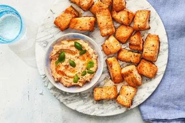 Crispy Salmon Bites with Creamy Sun-Dried Tomato Dipping Sauce