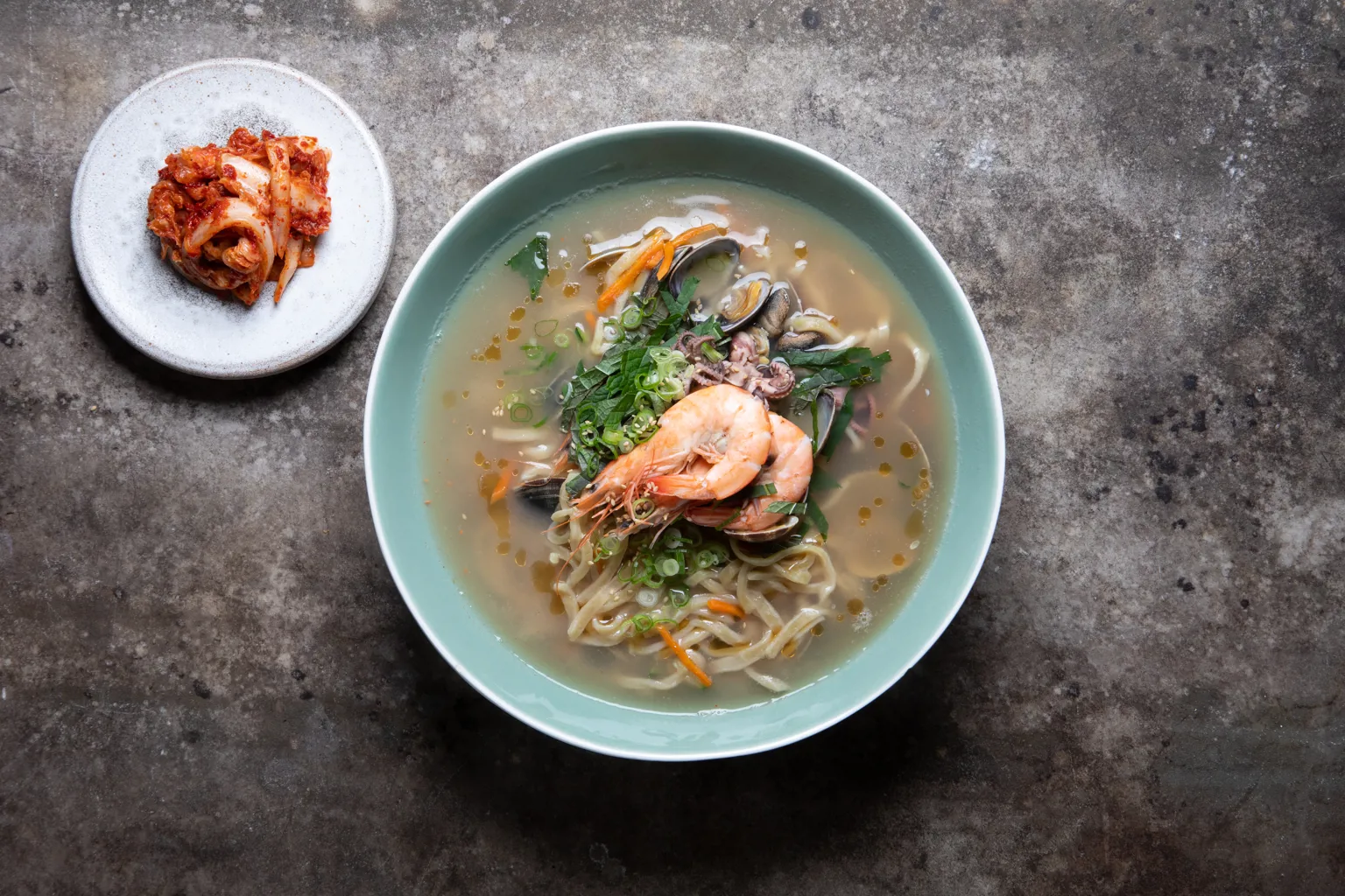 Seafood kalguksu with fresh kimchi